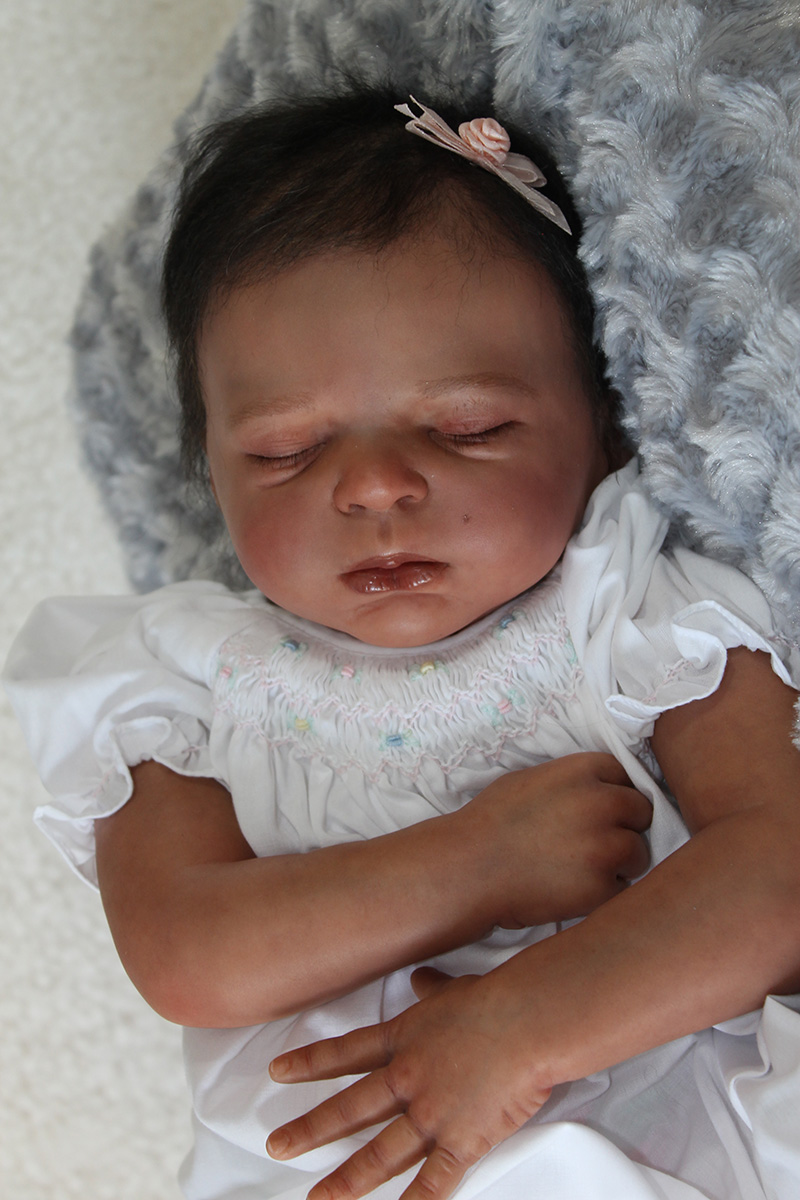 reborn baby that opens and closes eyes